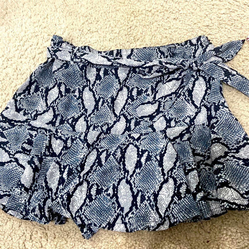 Black, grey, and light blue patterned skirt